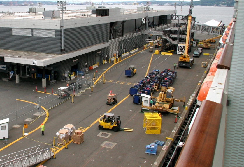 Description: luggage being loaded onto the ship